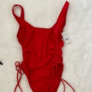 High legged one piece